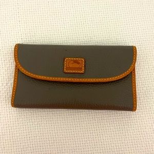 Dooney and Bourke wallet- beige colored pebbled leather red interior